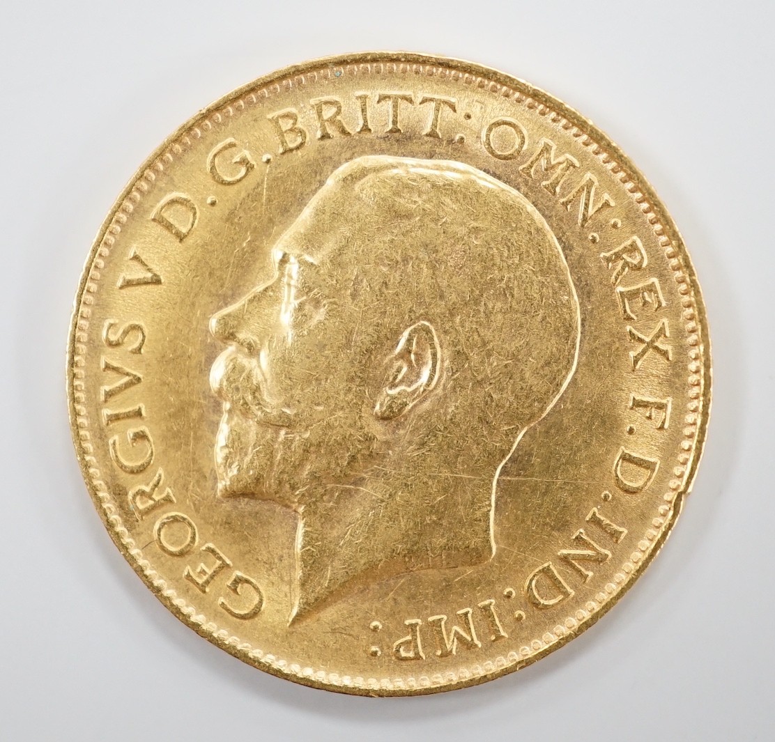 A George V 1911 gold half sovereign.